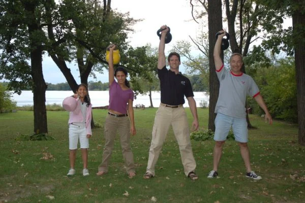 Kirk training a family with Kettlebells